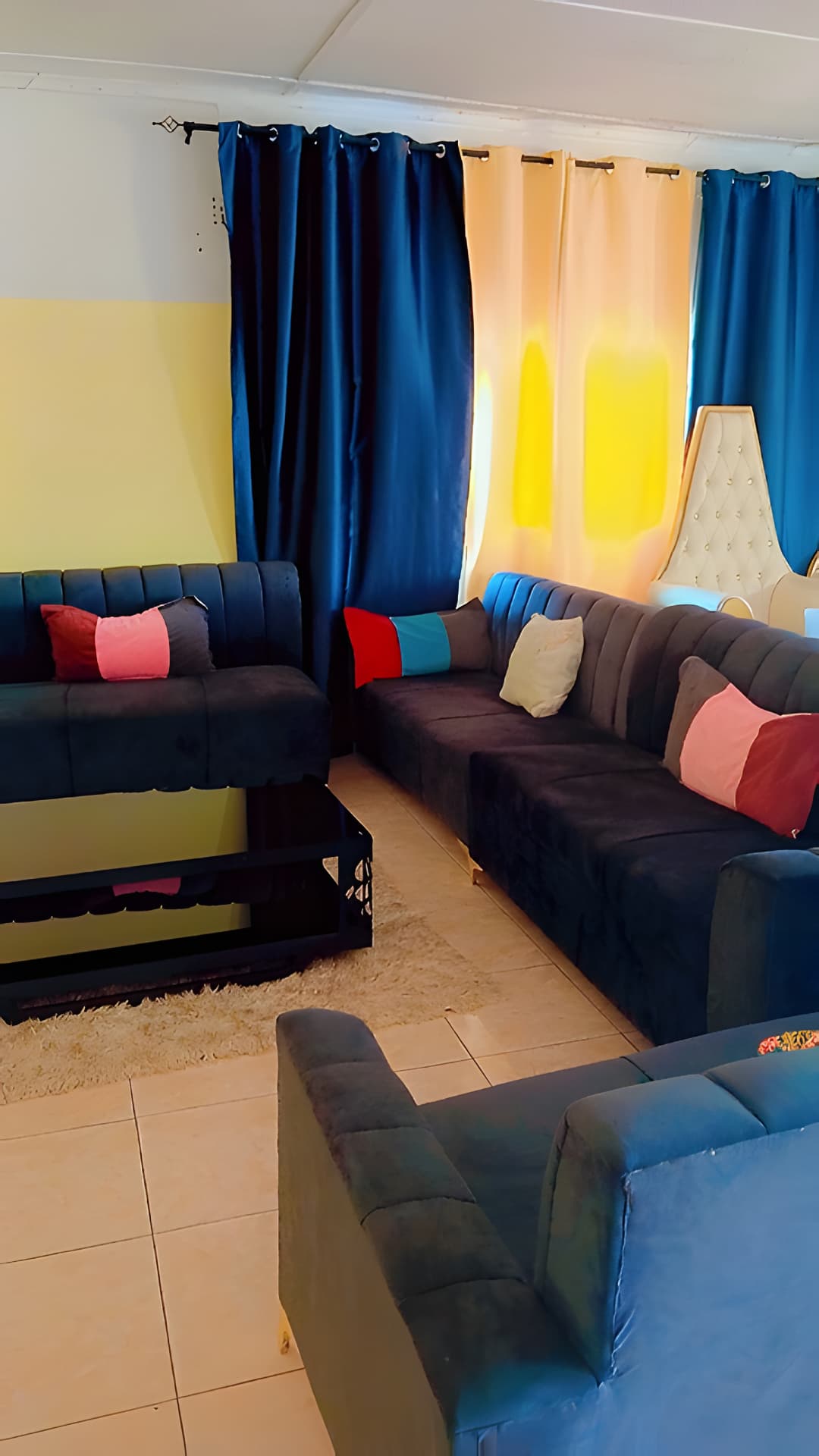 The Quantico Lodge sitting lounge with sofas and cushions